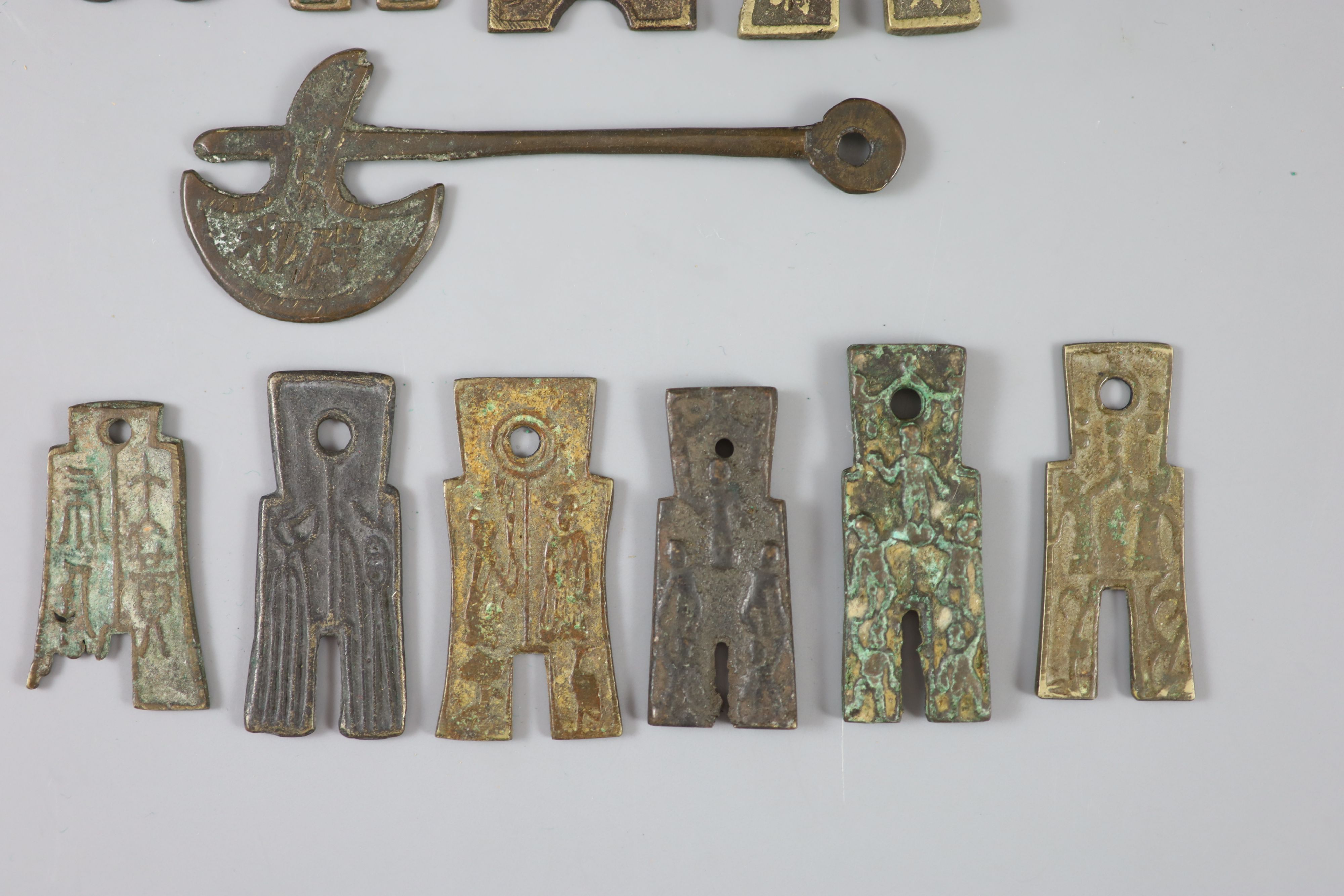 China, 11 bronze spade shaped charms or amulets, Qing dynasty,